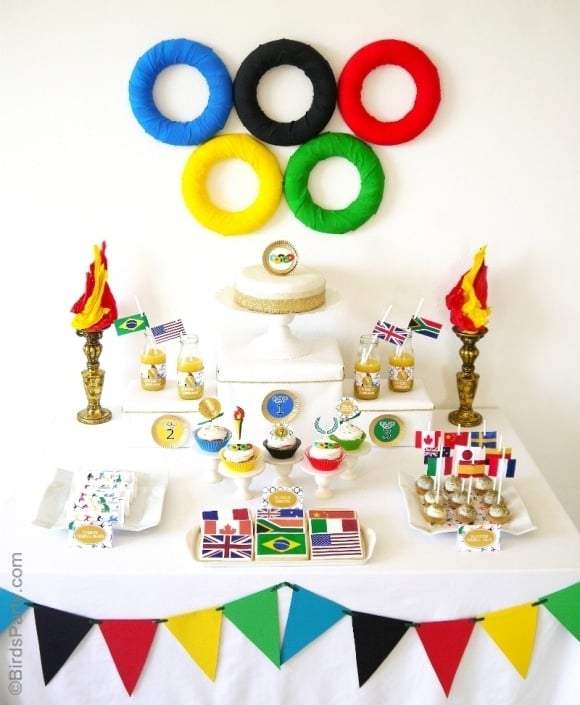 DIY Olympic Rings Dessert Backdrop, 13 Creative Olympic Party Ideas via Pretty My Party