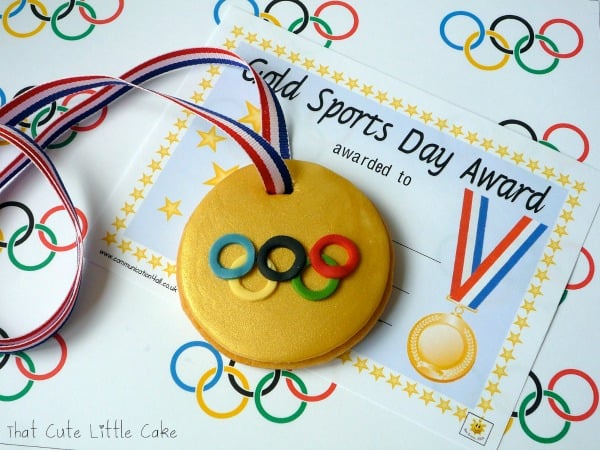 Olympic Gold Medal Cookie, 13 Creative Olympic Party Ideas via Pretty My Party