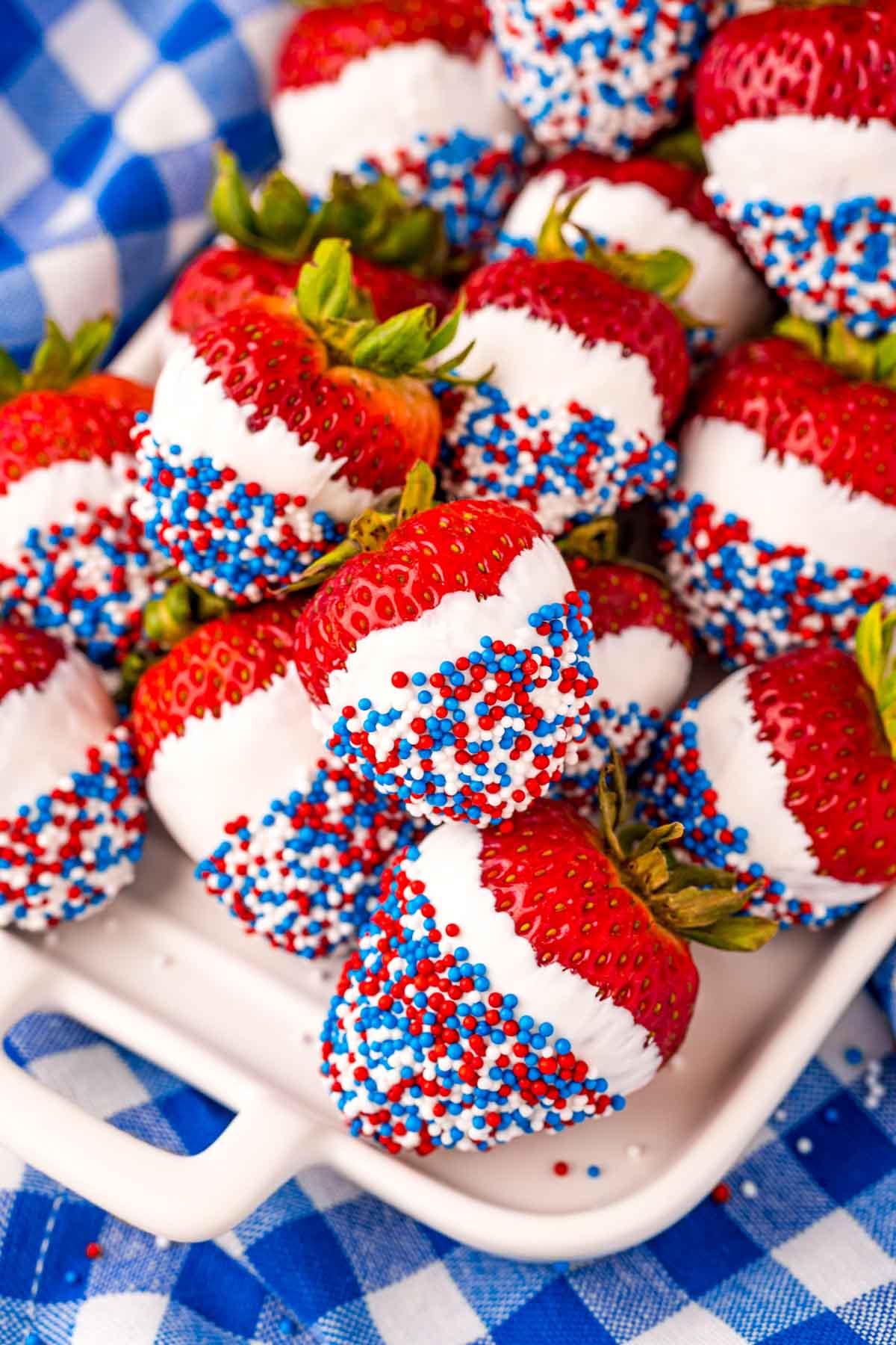 Patriotic red, white, and blue chocolate covered strawberries for 4th of July parties.