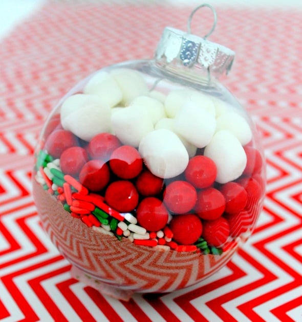 Easy DIY hot cocoa ornament with mini marshmallows, sprinkles and red candies
