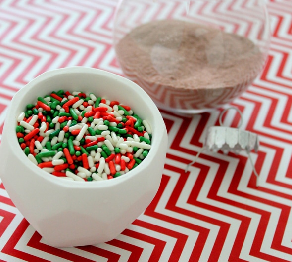 Hot Cocoa Christmas Ornaments with red, green, and white holiday sprinkles