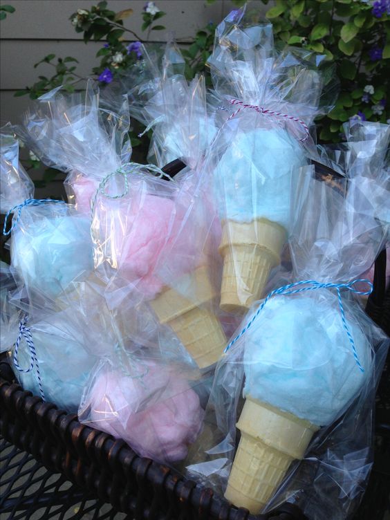 Blue and pink wrapped cotton candies for gender reveal parties.