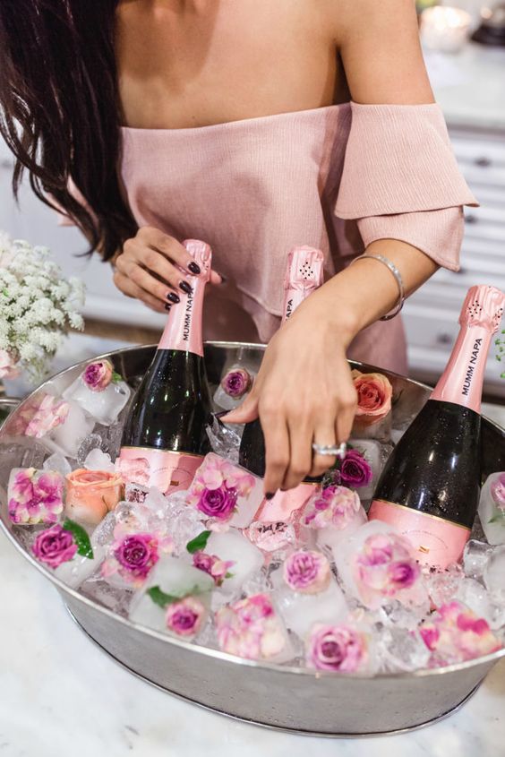 Pink flower champagne ice bucket for a bachelorette party