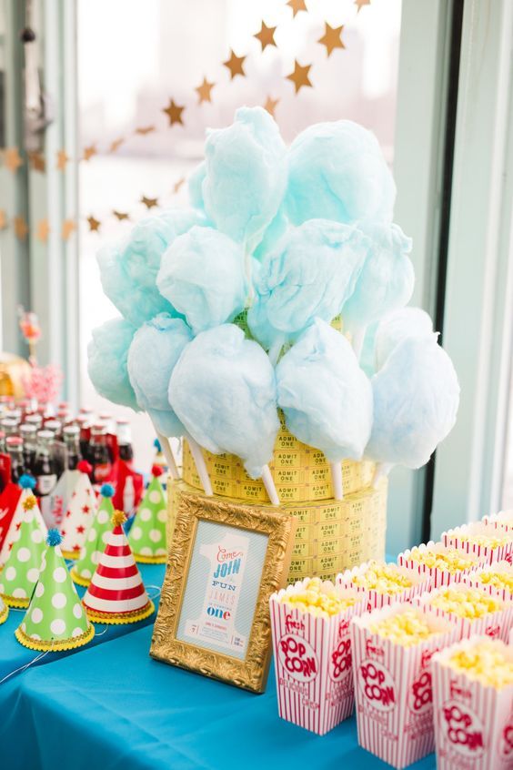 Place cotton candy in stack of tickets | Carnival Party Ideas