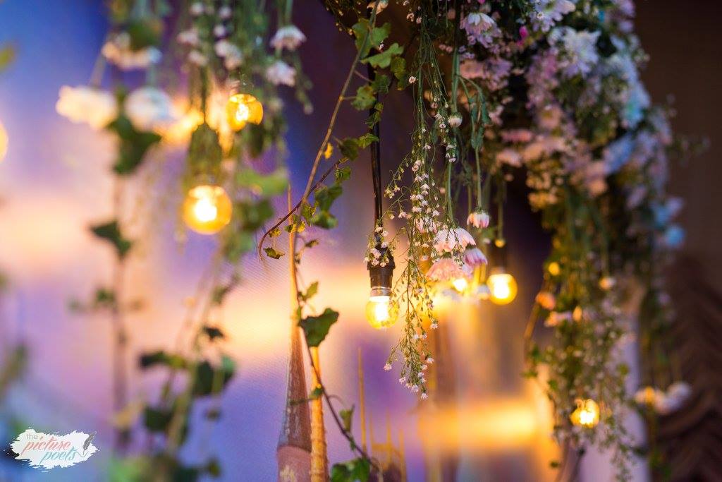 Cinderella party lighting and hanging florals.