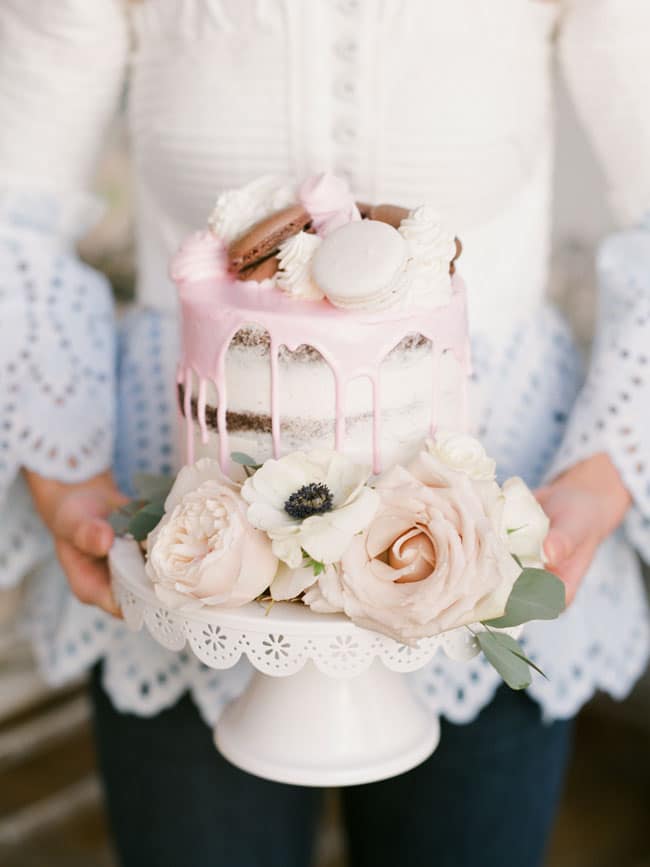 Pink Parisian Tea Party Naked Drip Cake With Macarons and Flowers