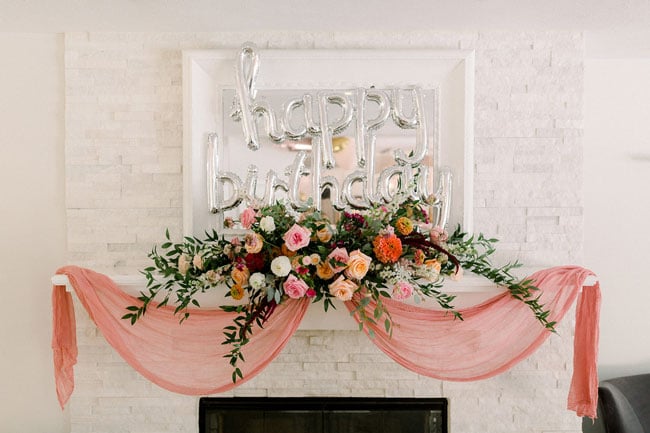 Floral Themed First Birthday fireplace decor