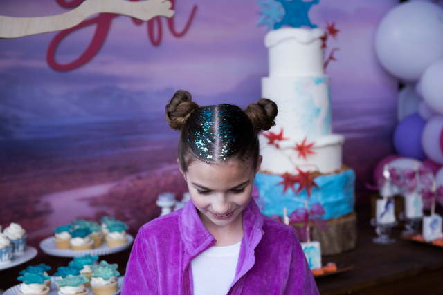 Frozen Party Bun Hairstyle With Blue Glitter