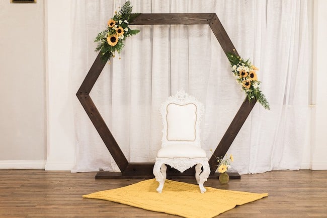 Wooden Photo Backdrop with Sunflower Decorations