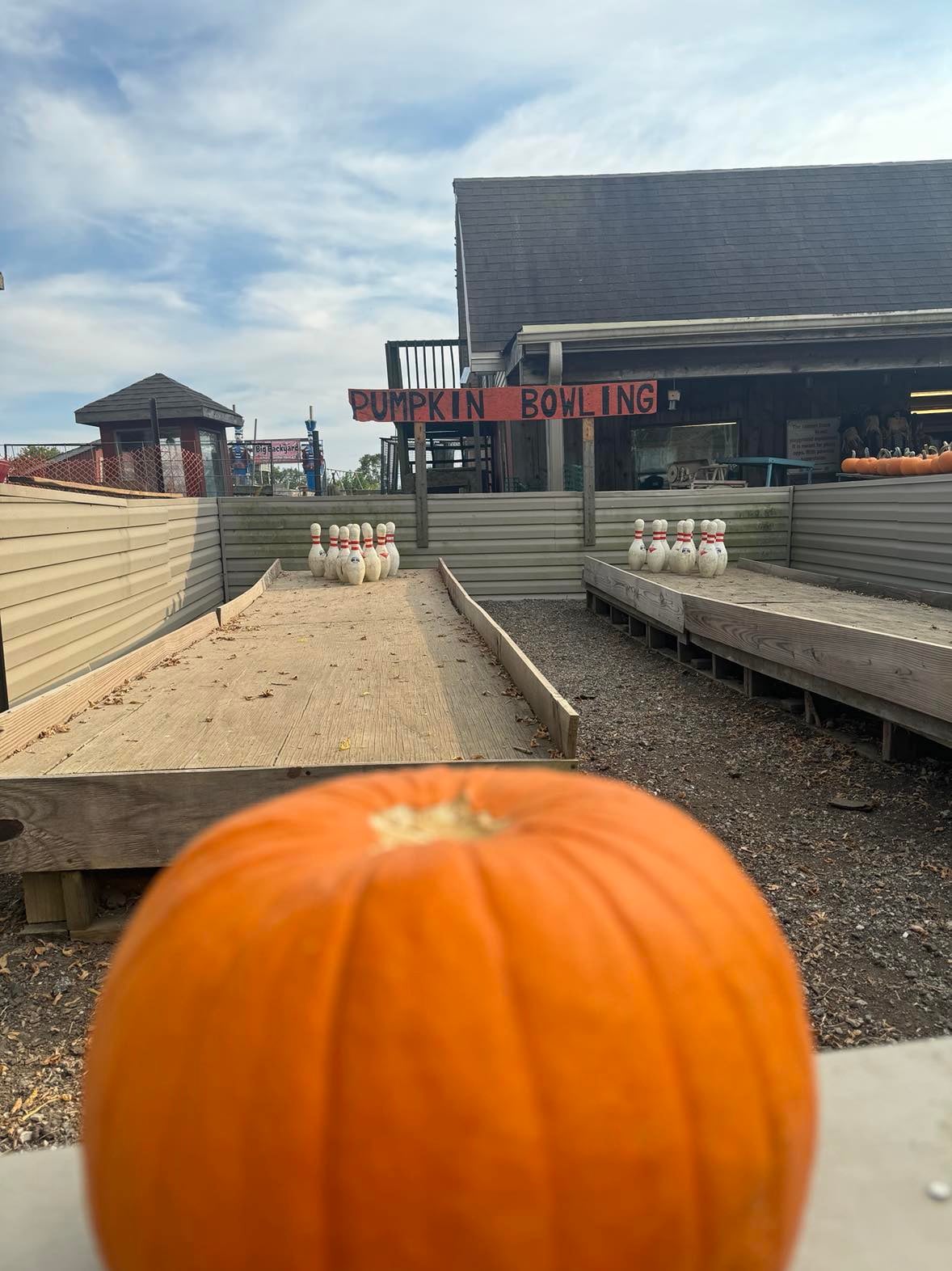 Pumpkin Bowling Game at a Fall Festival