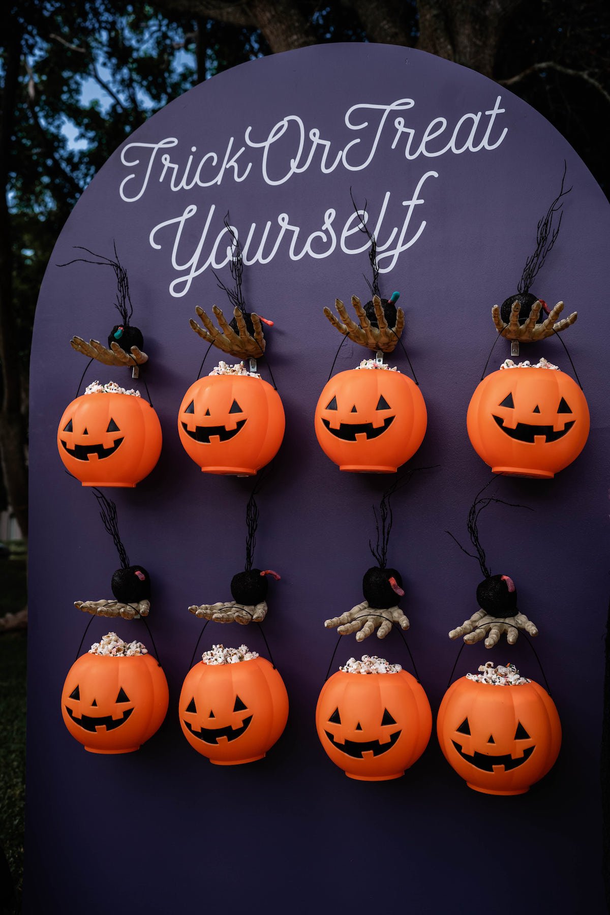 Trick or Treat Yourself party standee with jack-o-lanterns
