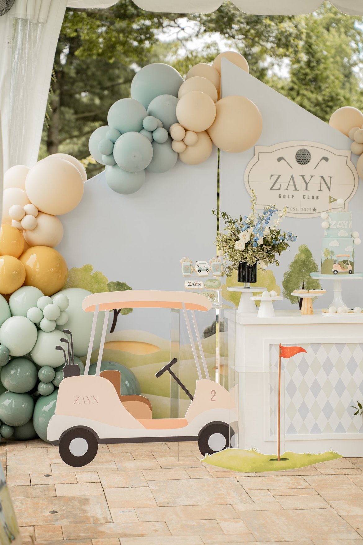 Adorable golf cart party decoration featured on Pretty My Party.