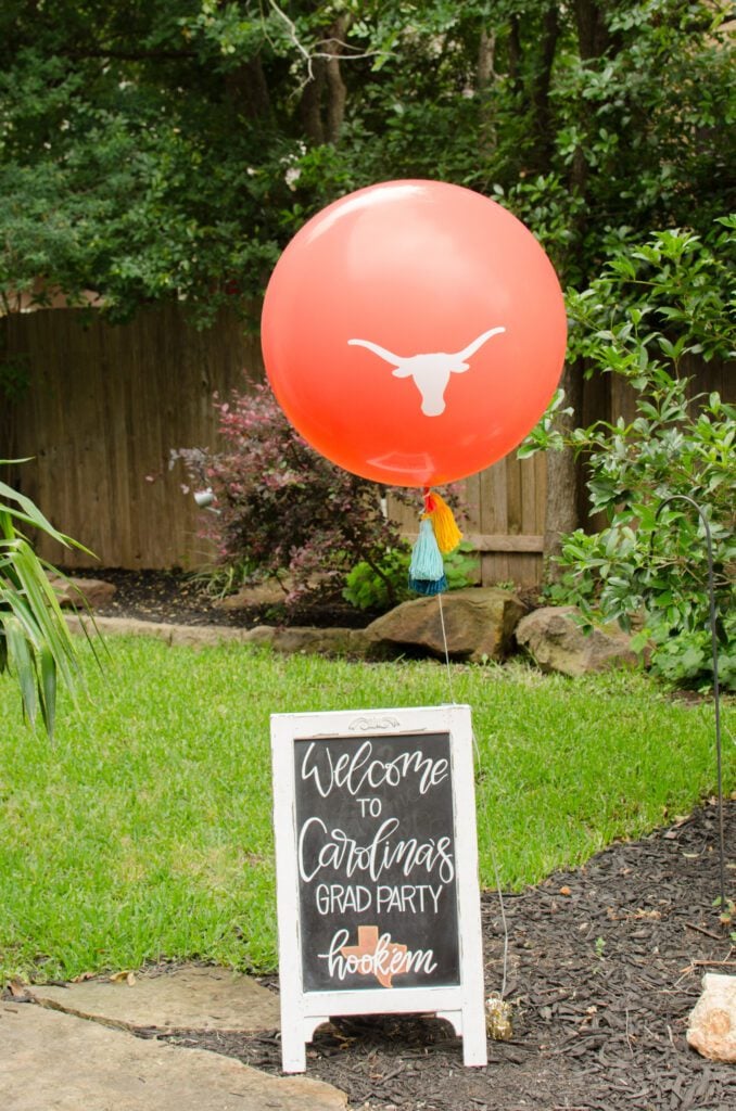 White wooden high school graduation sign