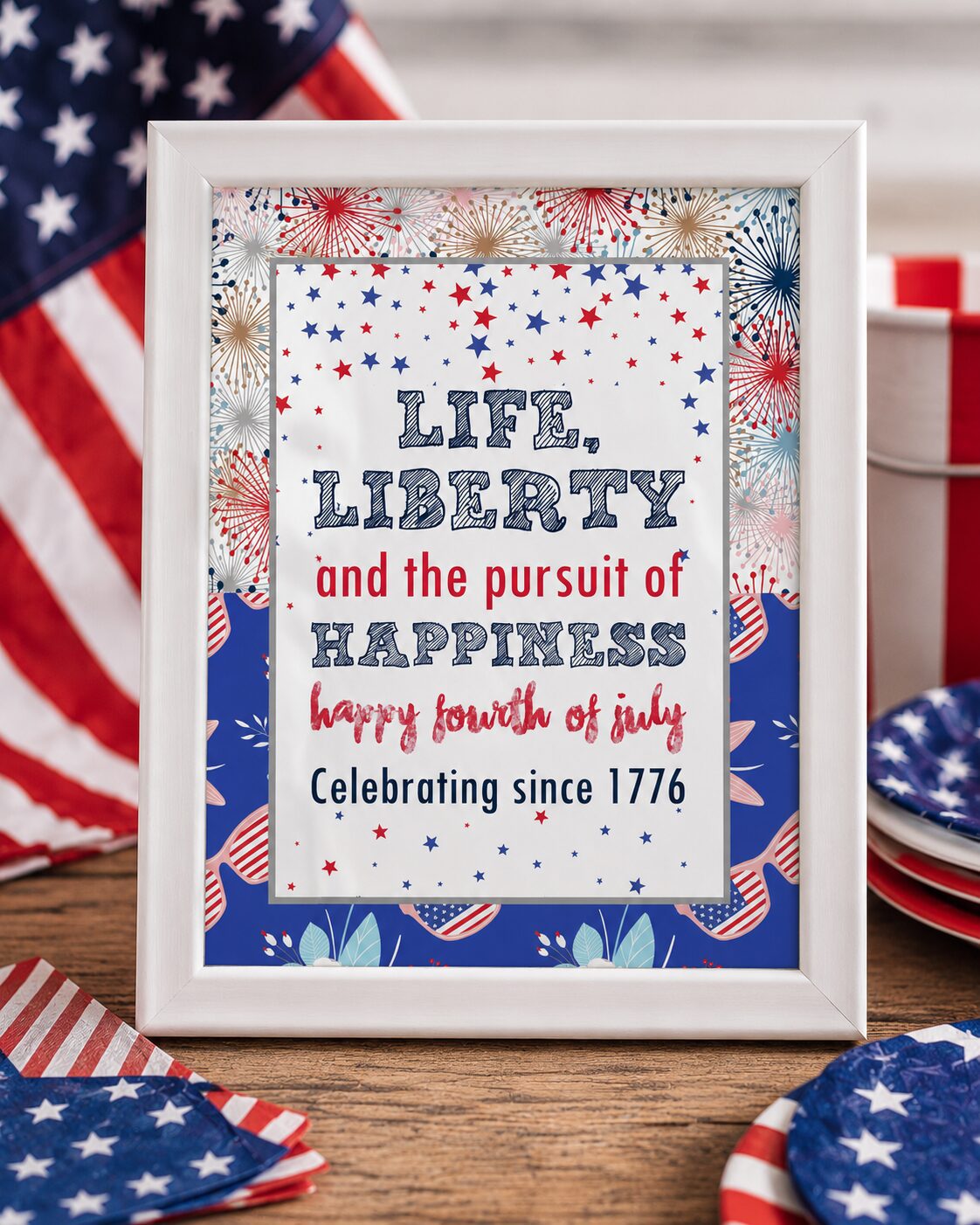 Add instant patriotic style to your celebration with this free Fourth of July printable sign! Frame it for your dessert table, party backdrop, mantel, entryway, or backyard BBQ setup. This red, white, and blue printable decoration is an easy way to make your Independence Day party feel festive and pulled together.