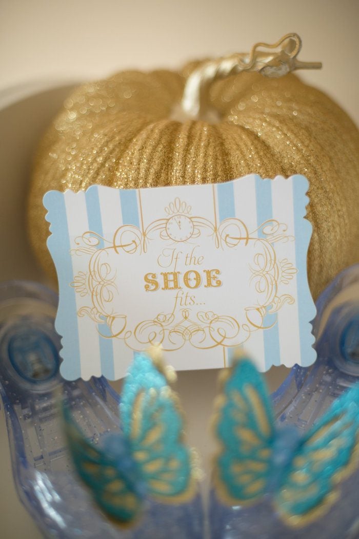 "If the shoe fits" Cinderella sign on a gold glitter pumpkin